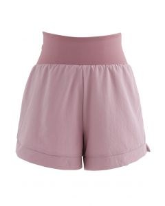 Shorts de ginástica de cintura cruzada em Dusty Pink
